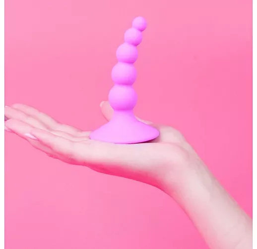 Розовый фигурный изогнутый анальный стимулятор из силикона Cosmo Dream - 9,5 см.