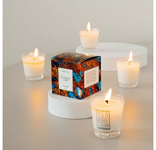 Массажная свеча "At Sunrise" с насыщенно-сладким ароматом, оттенками табака и какао - 50 мл.