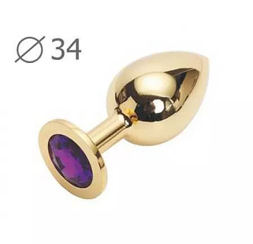 Коническая золотистая анальная втулка с кристаллом фиолетового цвета - 8,2 см.