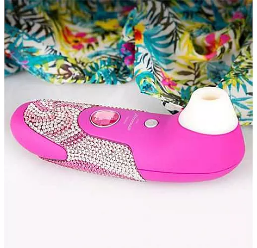 Розовый стимулятор клитора Womanizer Crystal Dreams