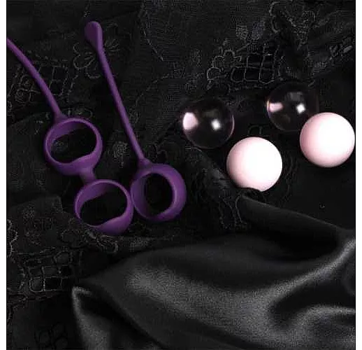 Фиолетовые вагинальные шарики Cosmo Balls с парой сменных шаров