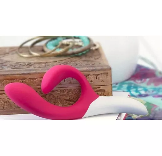 Розовый вибромассажёр с клиторальным отростком We Vibe Nova Pink - 21,5 см.