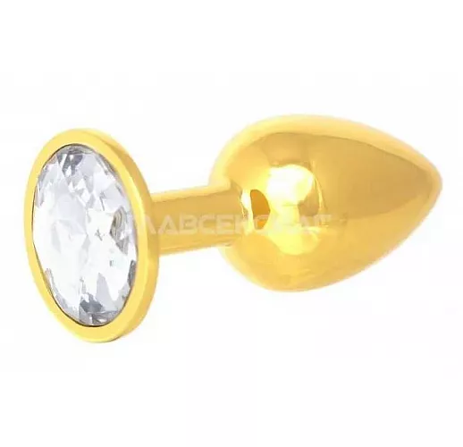 Золотистая анальная пробка с прозрачным кристаллом - 7 см. Золотистая анальная пробка с прозрачным кристаллом - 7 см.