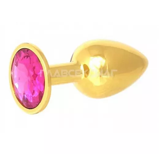 Золотистая анальная пробка с малиновым кристаллом - 7 см. Золотистая анальная пробка с малиновым кристаллом - 7 см.